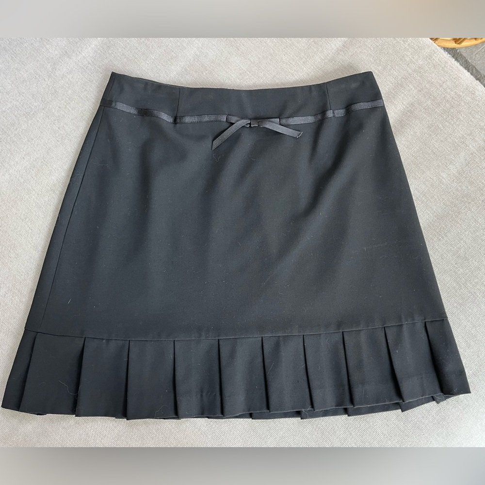 Adorable black skirt.  18” long.